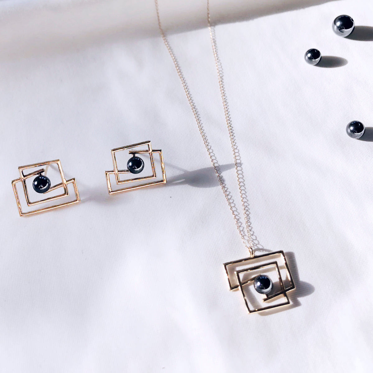 Volten Square Earrings 14k gold- hematite