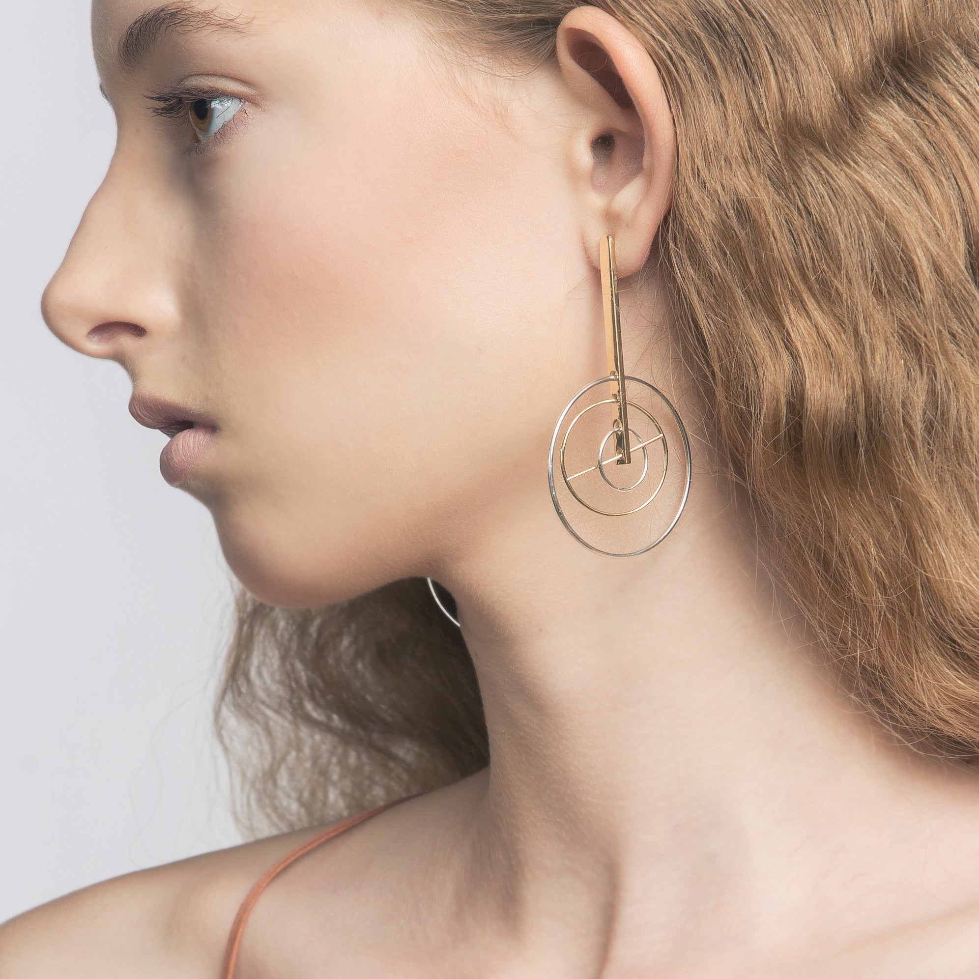 Kinetic Earring detail on model